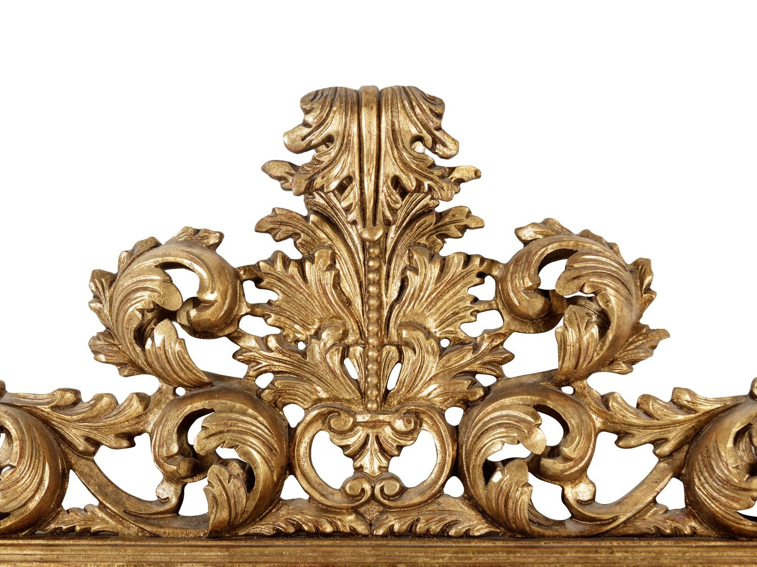 An Italian Baroque Style Giltwood Mirror