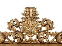 An Italian Baroque Style Giltwood Mirror