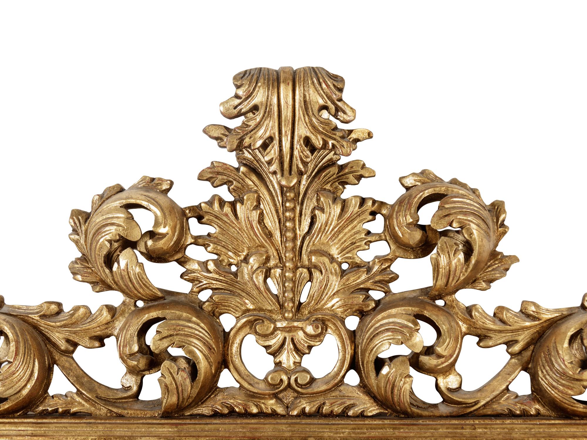 An Italian Baroque Style Giltwood Mirror
