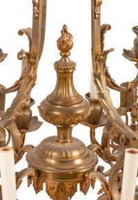 A Louis XV Style Gilt Bronze Sixteen-Light Chandelier