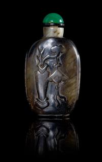 A Black and White Jade Snuff Bottle Height 3 inches. — 19TH CENTURY
