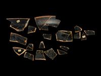 18 Attic Black-Figured Band Cup Fragments with Warriors and Sphinxes