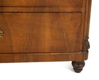 A Continental Walnut Chest of Drawers