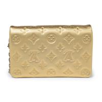 Louis Vuitton, Coussin Bag in Gold Empreinte Leather