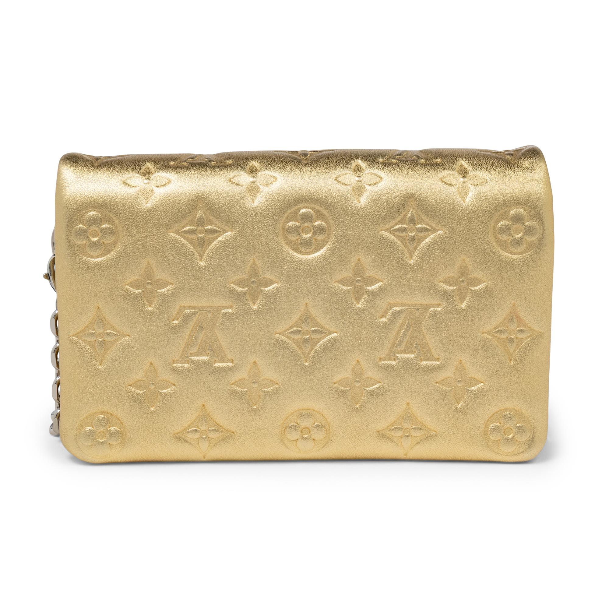 Louis Vuitton, Coussin Bag in Gold Empreinte Leather