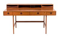 A Teak Flip-Top Partner's Desk, Peter Lovig Nielsen for Dansk Height 33 3/4 x width 63 3/4 x depth 28 3/4 inches. — CIRCA 1970