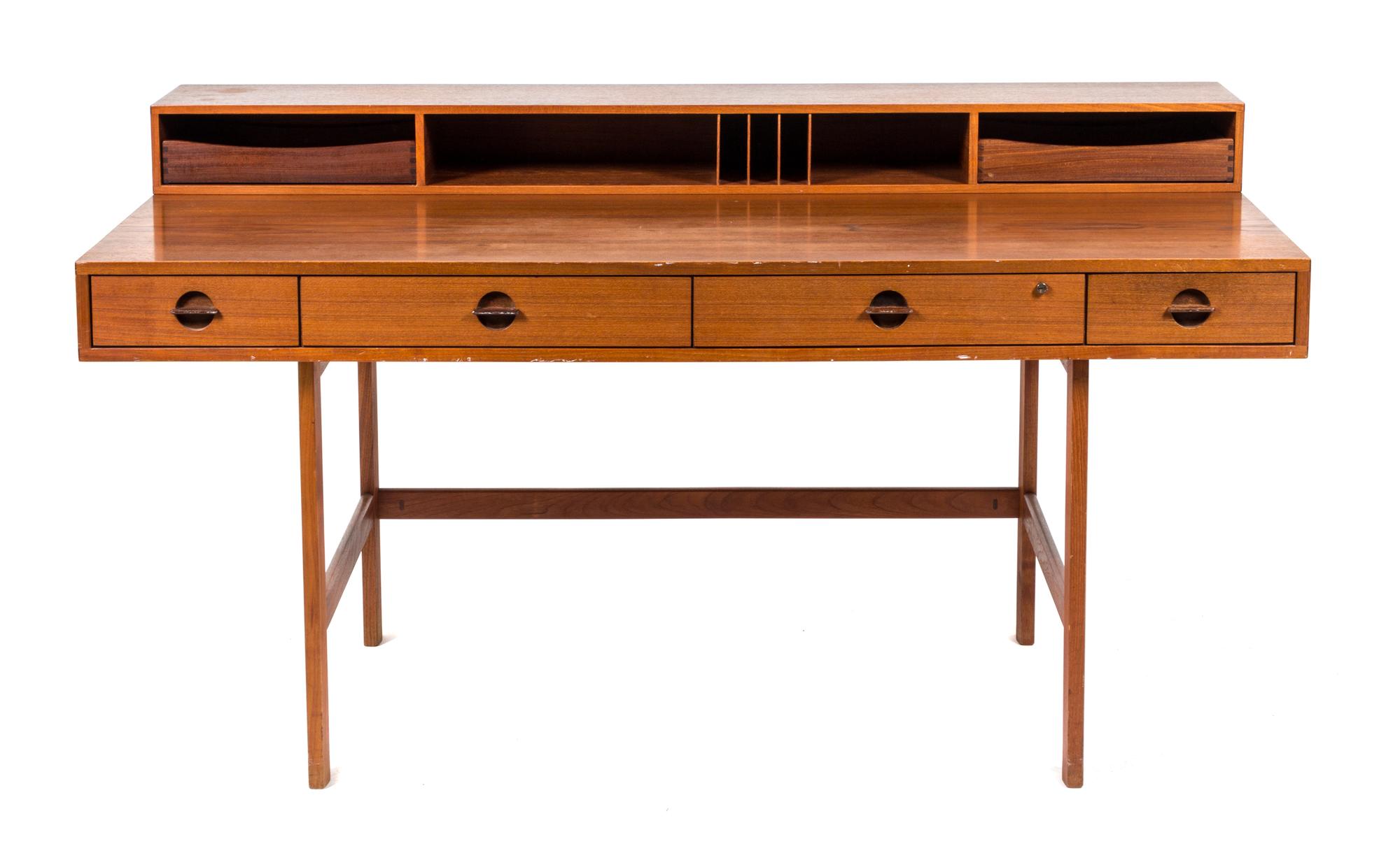 A Teak Flip-Top Partner's Desk, Peter Lovig Nielsen for Dansk Height 33 3/4 x width 63 3/4 x depth 28 3/4 inches. — CIRCA 1970