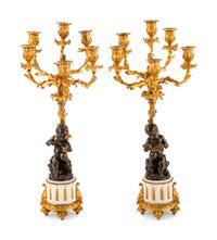 A Pair of Louis XVI Style Gilt and Patinated Bronze Six-Light Figural Candelabra