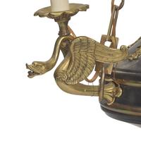 A French Empire Style Gilt Bronze and Black-Painted Three-Light Chandelier