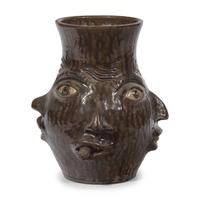 Charlie West, A Glazed Stoneware Work: Four-Sided Face Jug