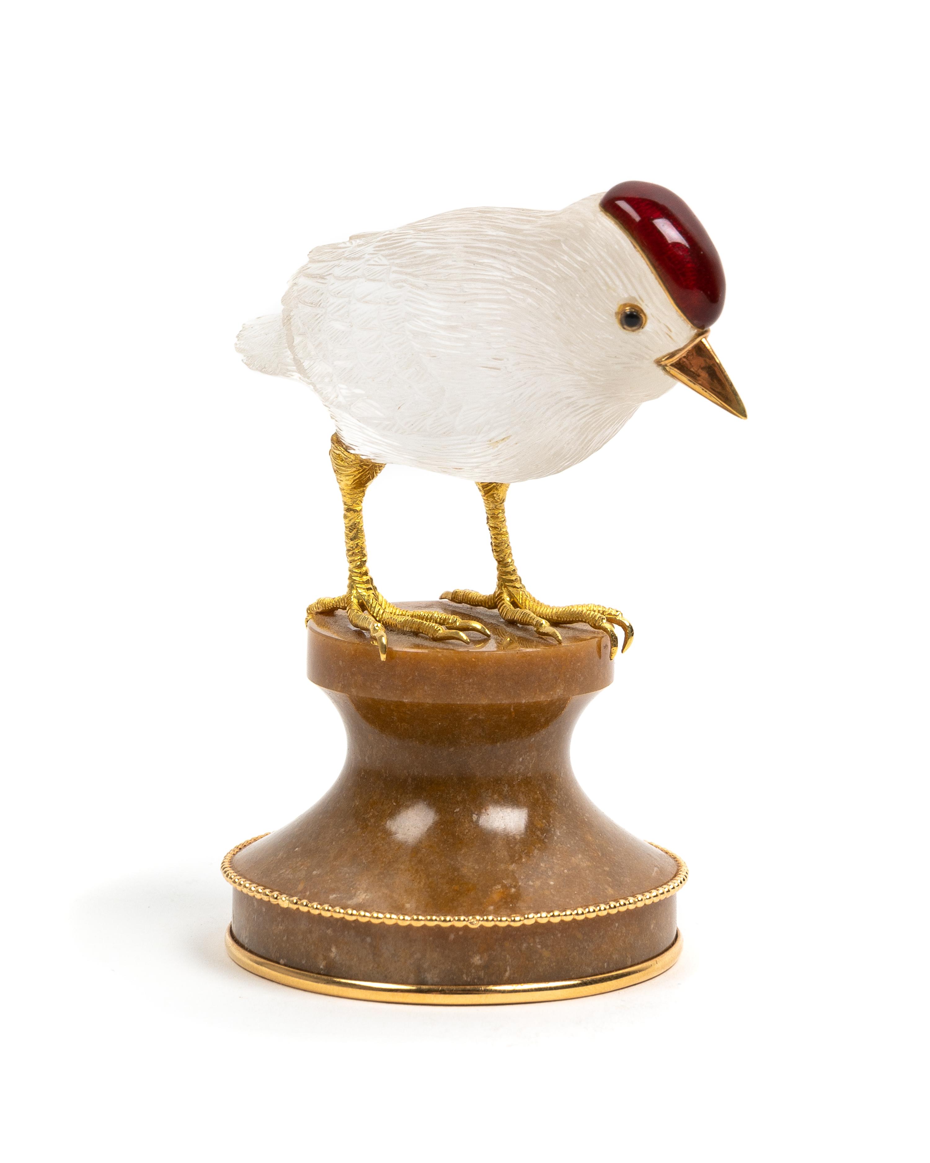 A French 18 Karat Gold Mounted, Enamel and Carved Quartz Zoomorphic Figure, Boucheron, Paris, 20th Century, of a bird on a carved hards