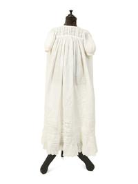 A Victorian Child's Mannequin Dressed in a White Christening Dress — 19TH CENTURY
