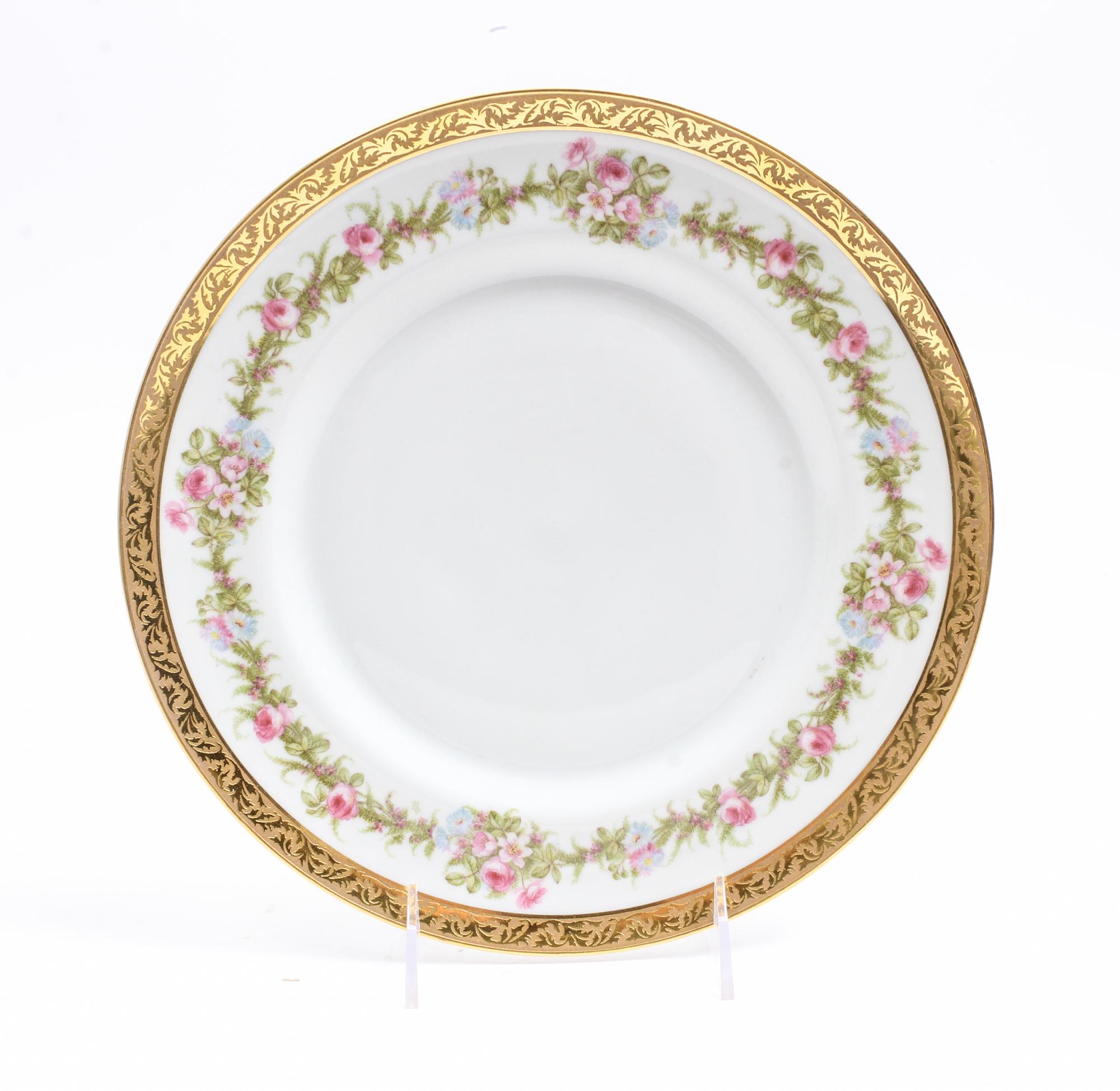 A Group of Twelve M. Redon Limoges Porcelain Dinner Plates Diameter 10 1/4 inches. — 20TH CENTURY