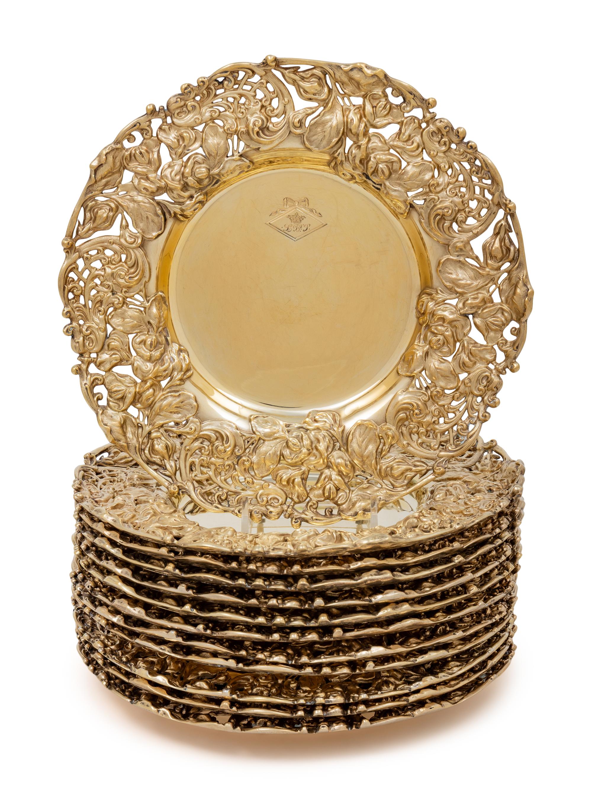 A Set of Eleven American Silver-Gilt Reticulated Plates