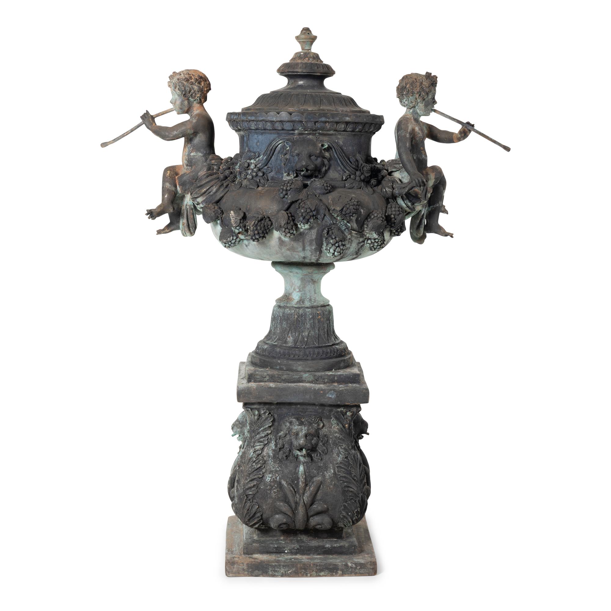 A Patinated Bronze Fountain Urn on Plinth