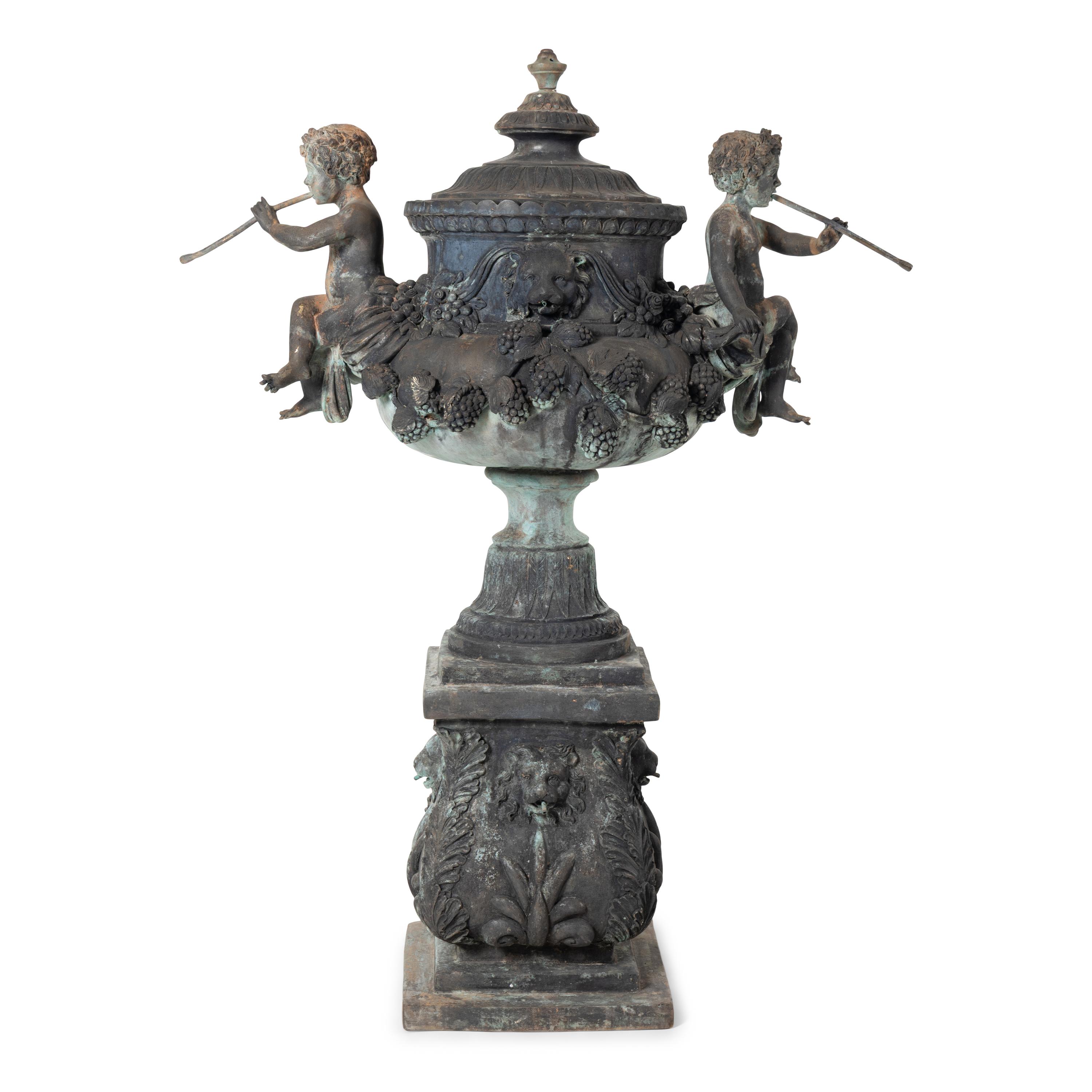 A Patinated Bronze Fountain Urn on Plinth