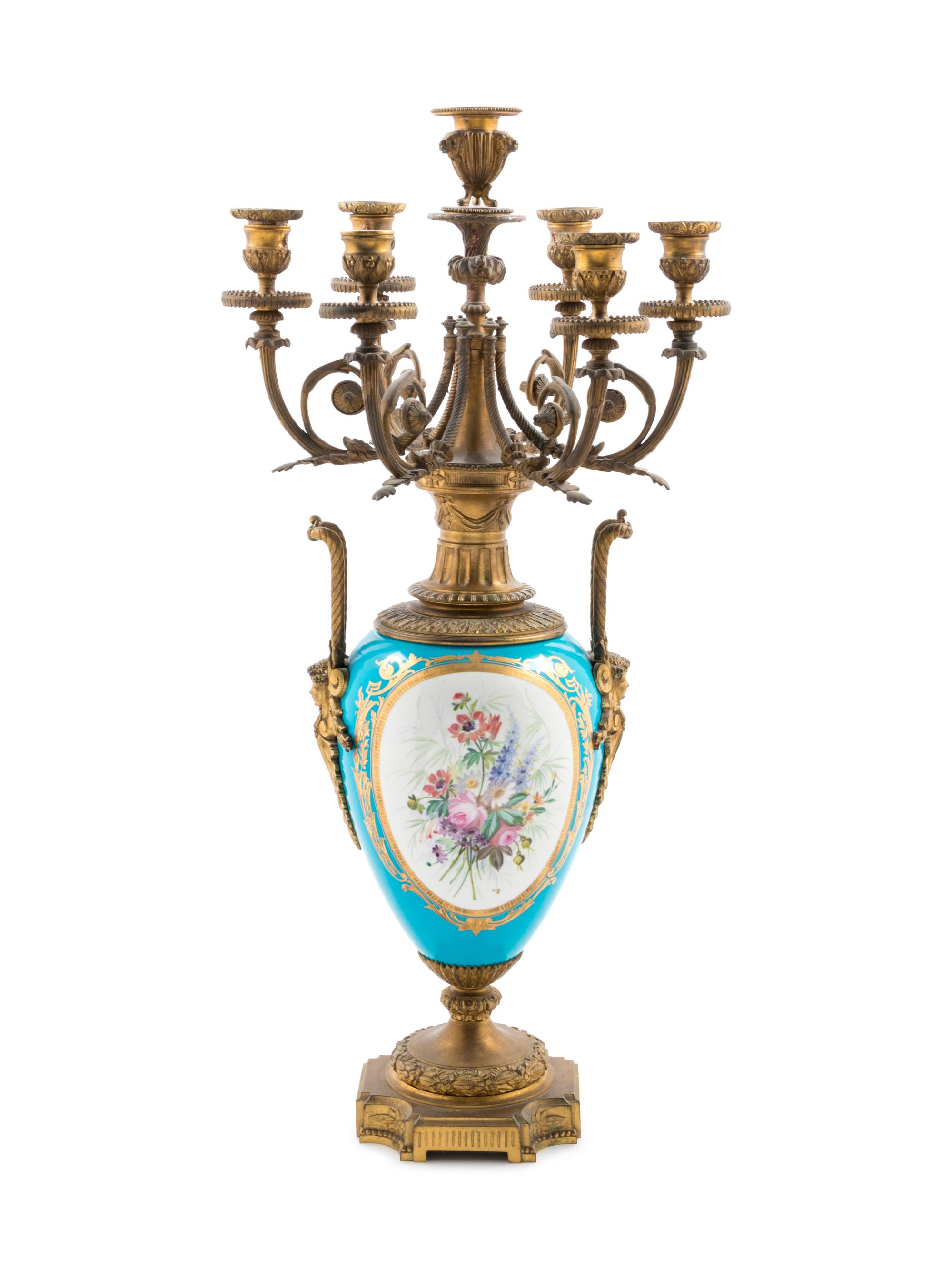 A Sèvres Style Gilt Bronze Mounted Painted and Parcel Gilt Celeste-Blue Ground Porcelain Seven-Light Candelabrum