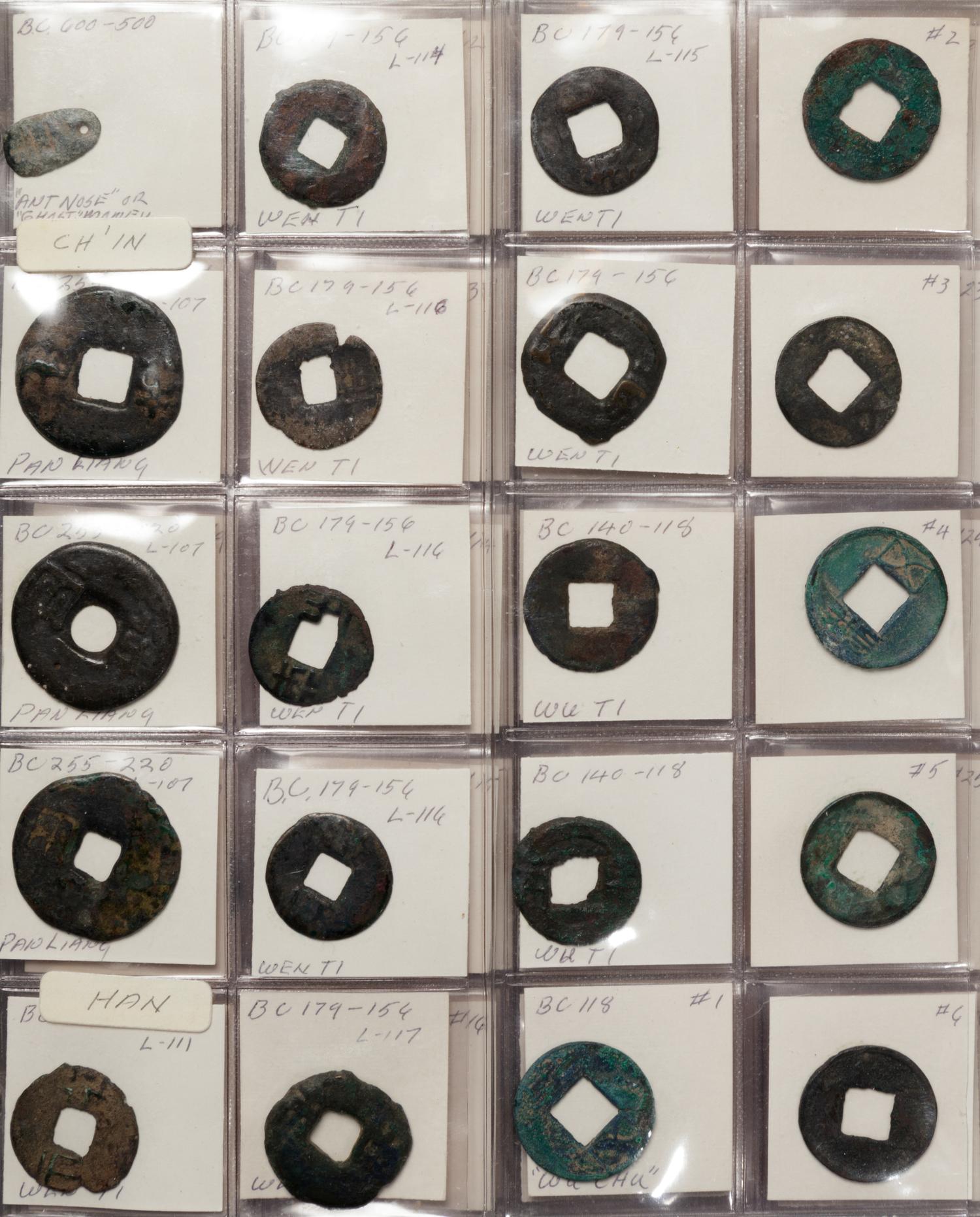 A Large Collection of Chinese Coins and Pendants