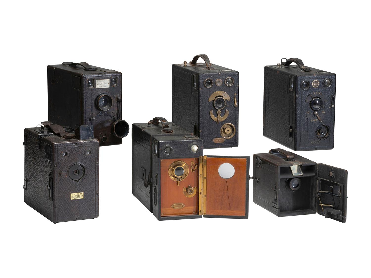 [CAMERAS]. 6 falling plate cameras, incl. the Midg and Murer's Express Newness cameras.