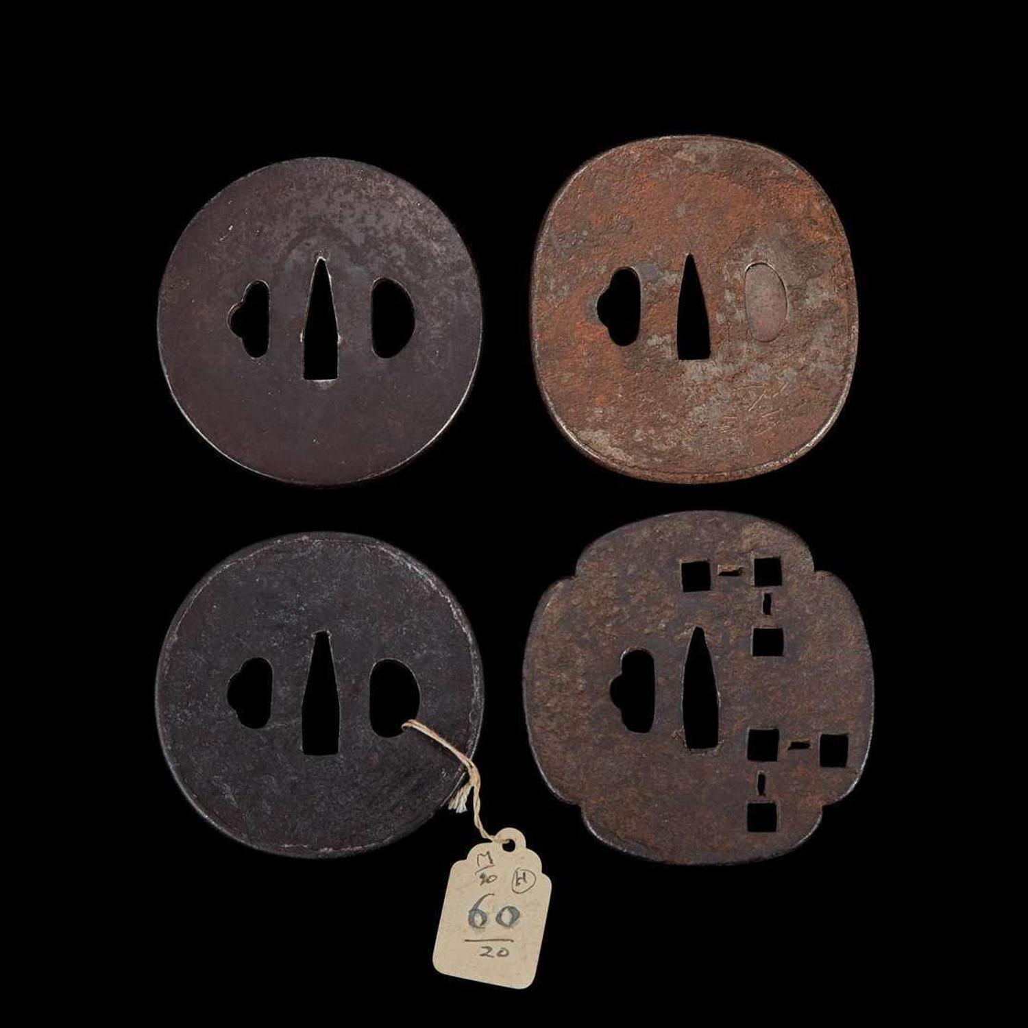Group of twelve assorted Japanese iron tsuba