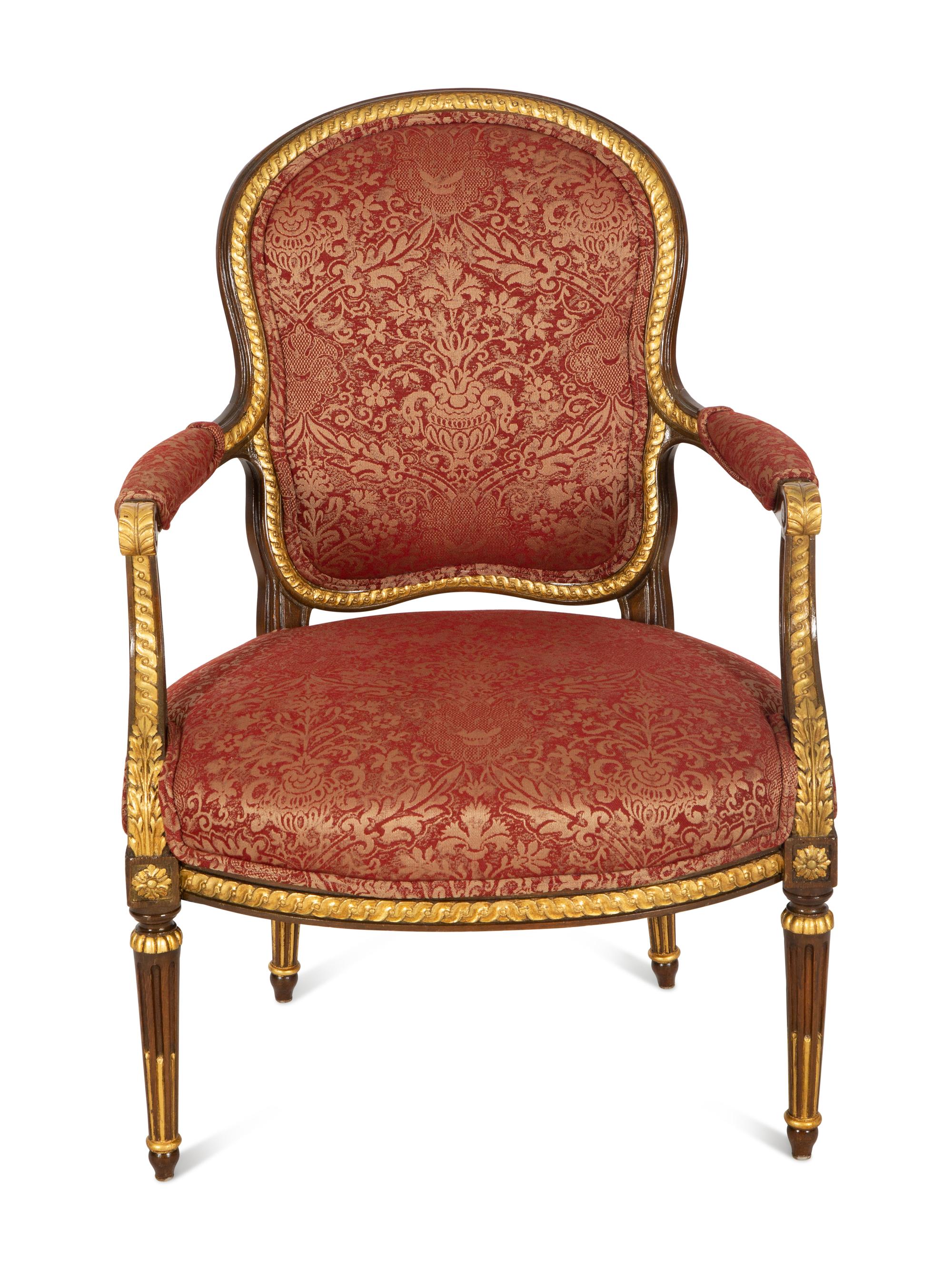 A Louis XVI Style Stained and Gilt Mahogany Fauteuil