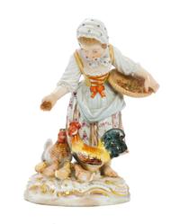 A Meissen Porcelain Figural Group, Height 4 5/8 inches.