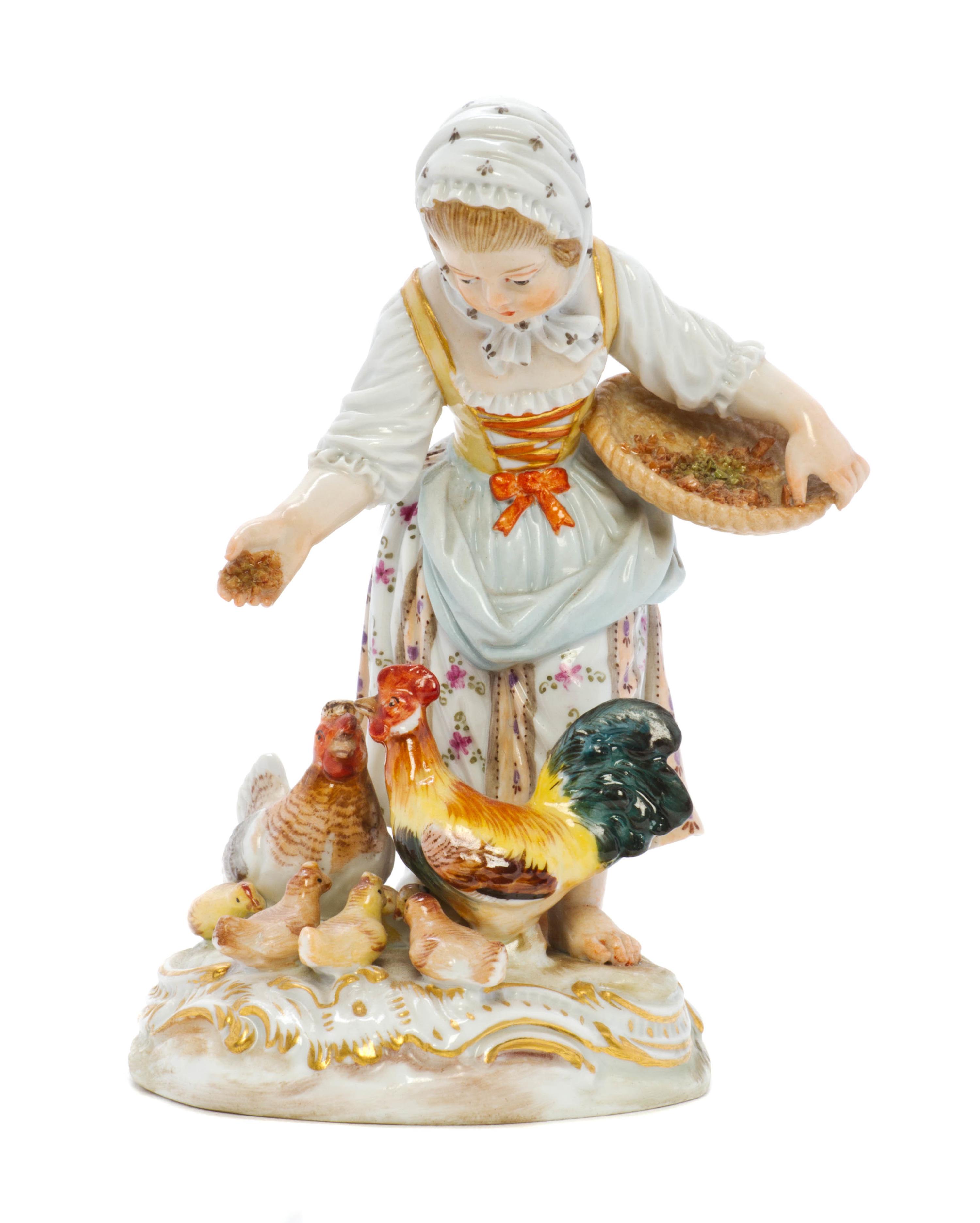 A Meissen Porcelain Figural Group, Height 4 5/8 inches.