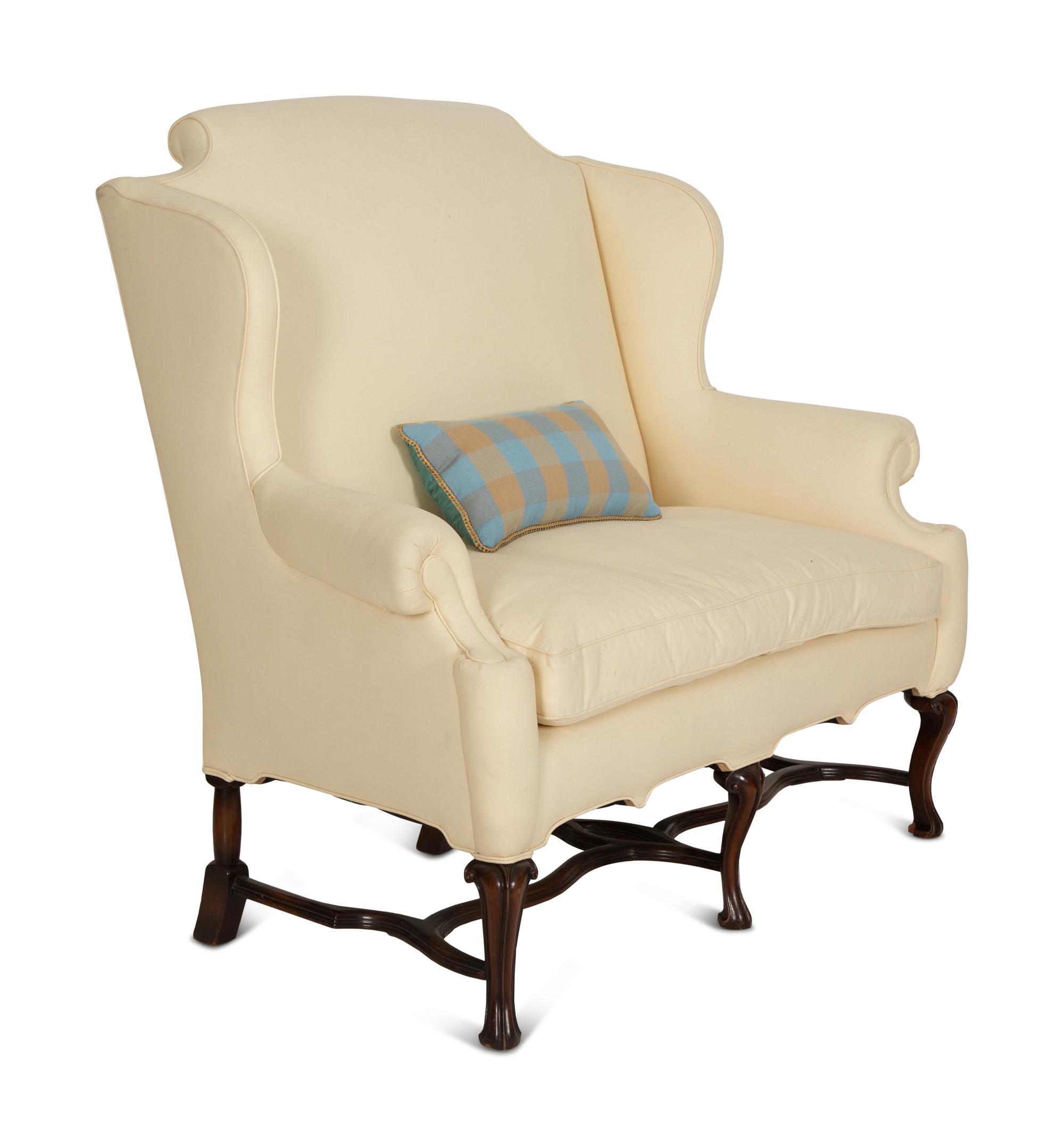 A William & Mary Style Carved Oak Upholstered Wing Back Settee
