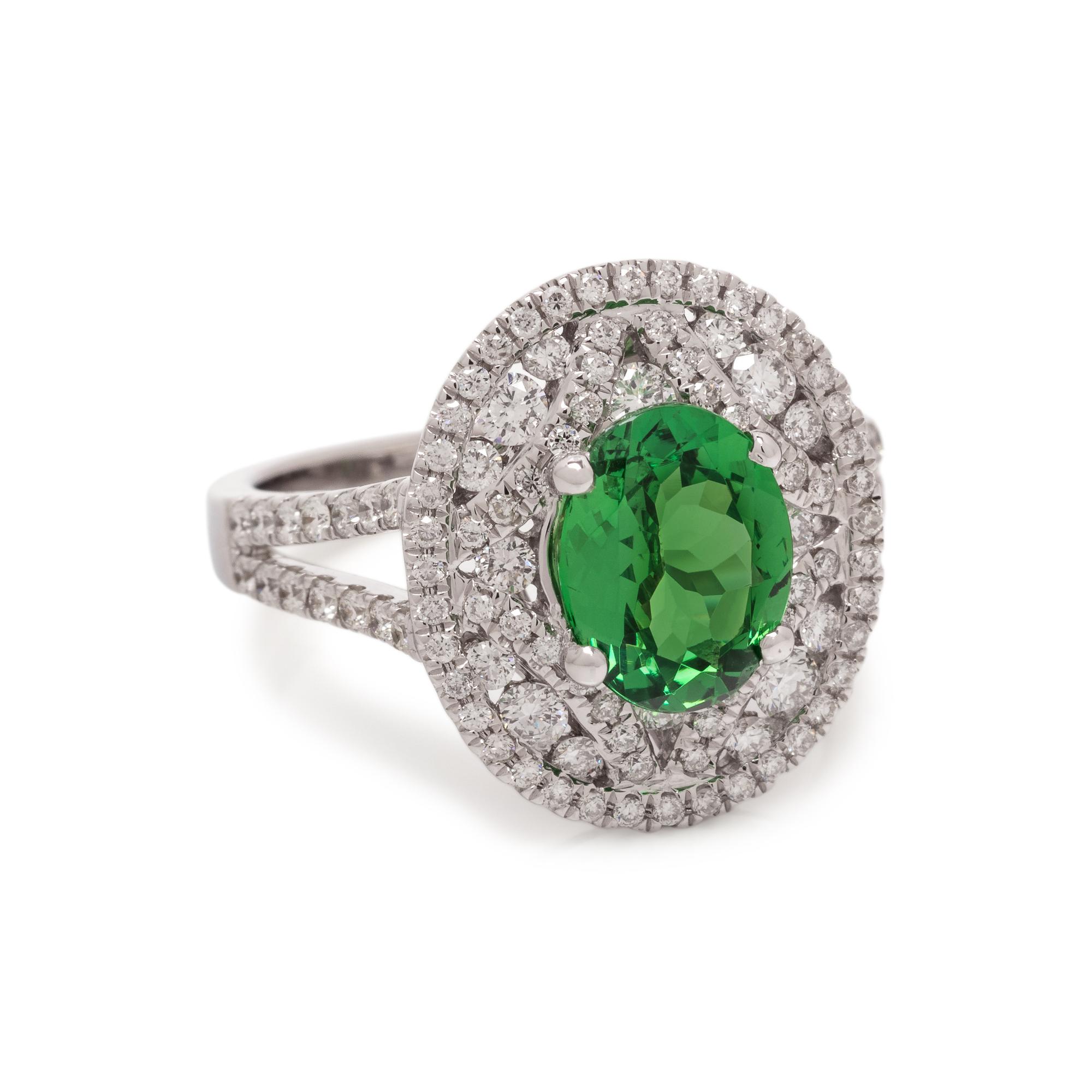 TSAVORITE GARNET AND DIAMOND RING