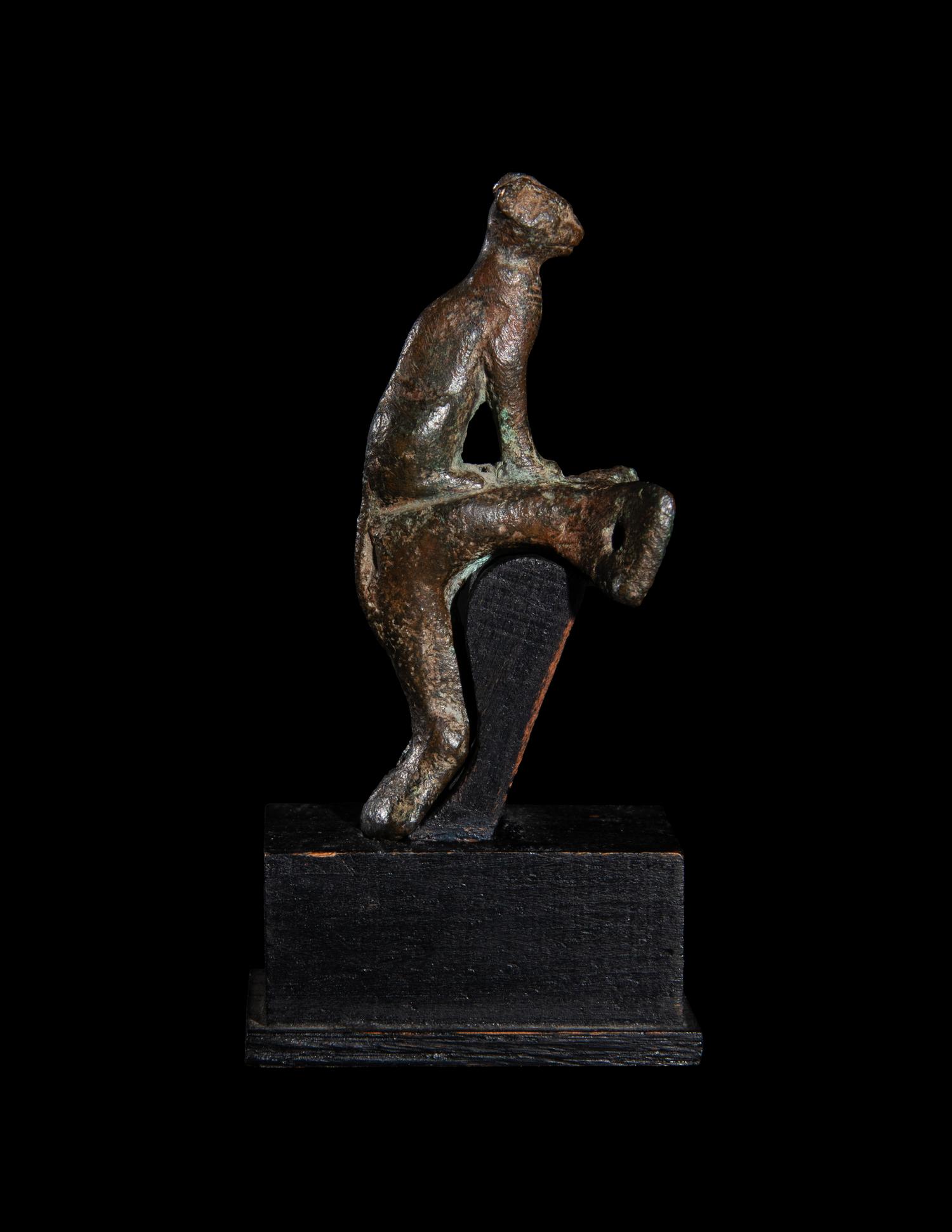 An Egyptian Bronze Handle with a Cat