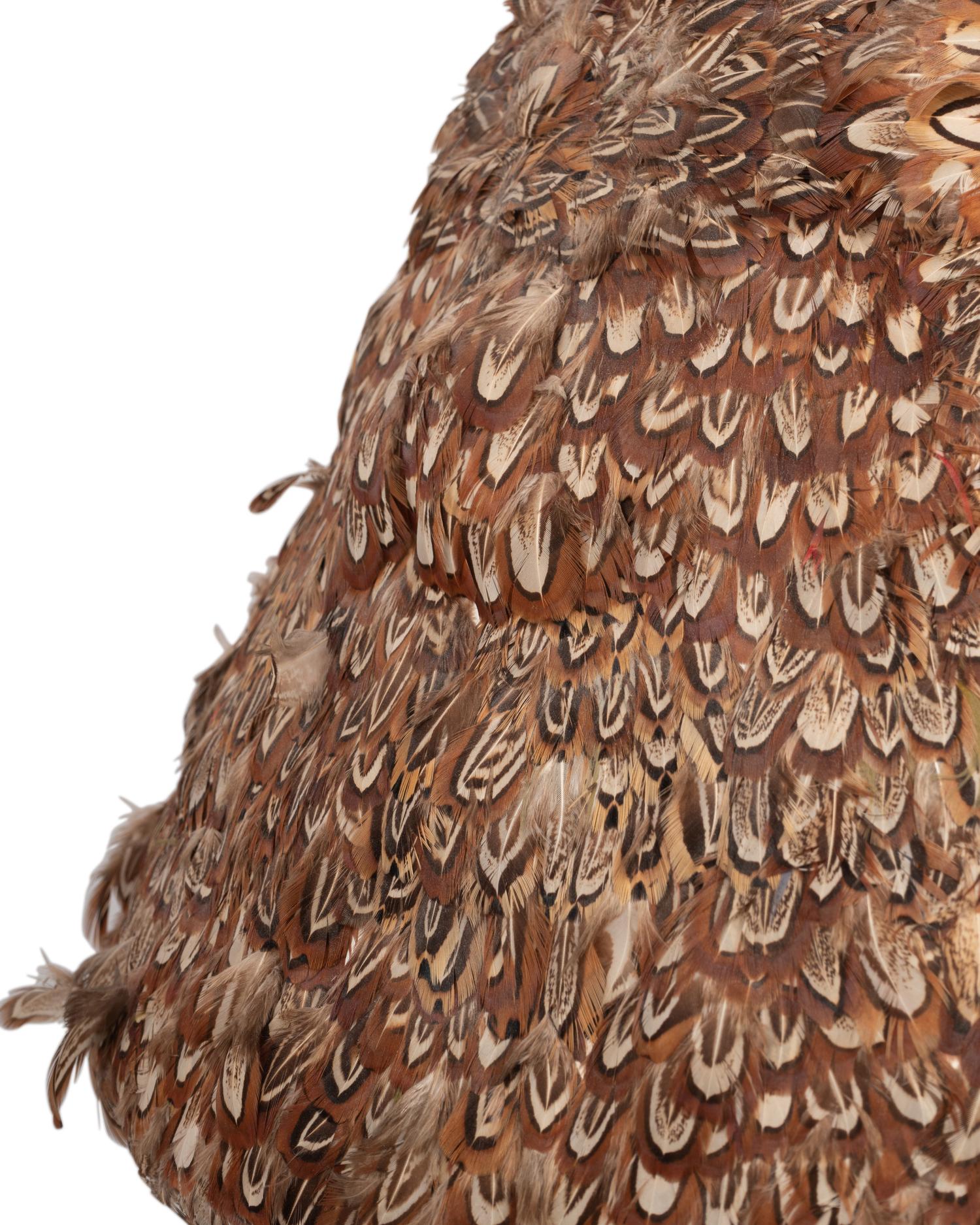 A Silvered Table Lamp with a Quail Feather Shade