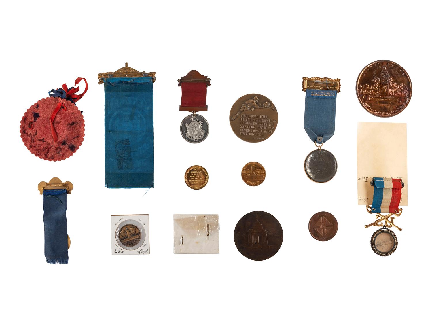 [CIVIL WAR]. A group of 29 GAR medals and ribbons associated with the Battle of Gettysburg, including: