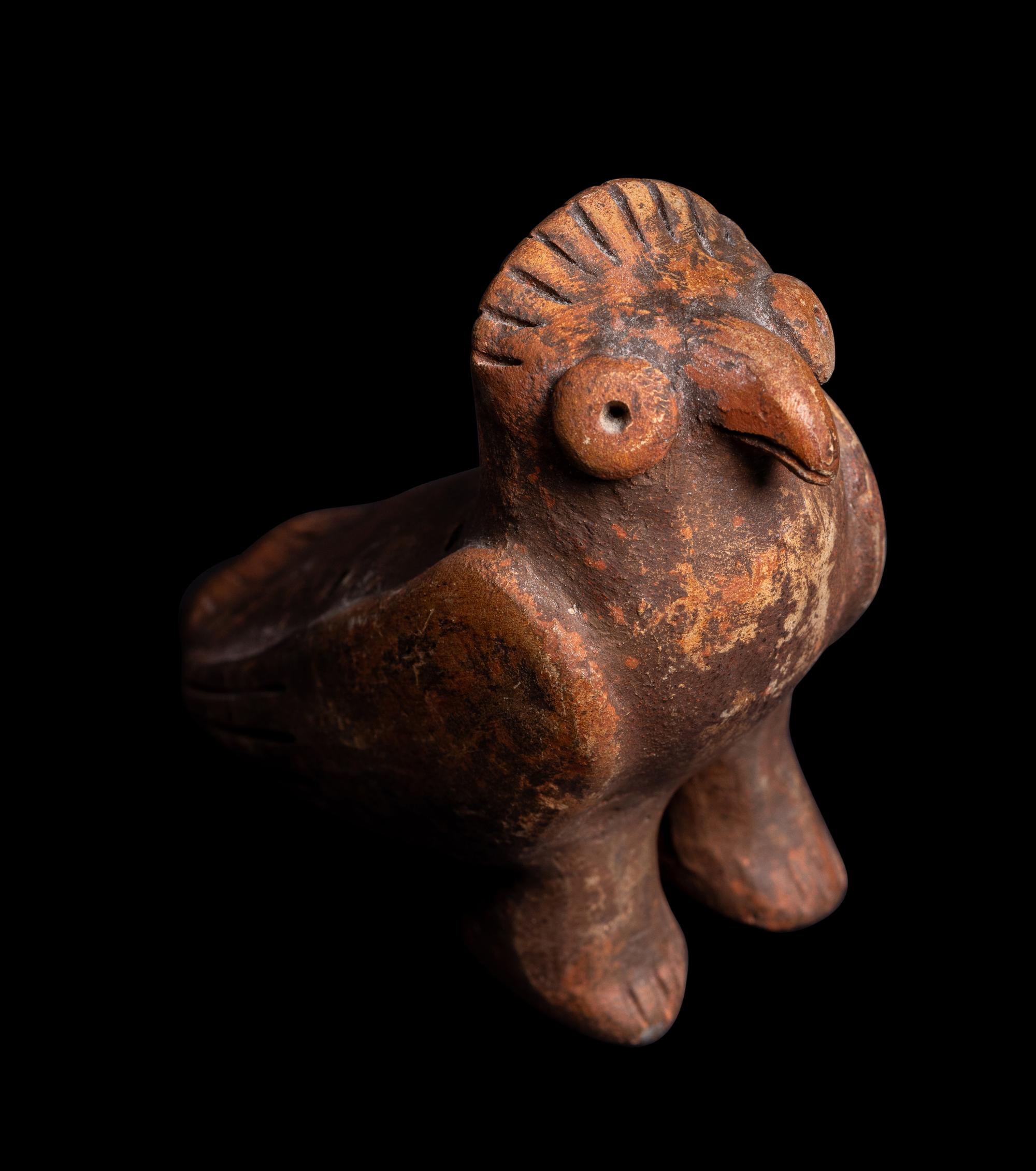 Thirteen Costa Rican and Panamanian Ocharinas (Whistles) and One Stone Instrument