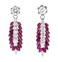 A Pair of White Gold Diamond Stud Earrings with Removable White Gold, Ruby and Diamond Enhancer Pendants, 6.70 dwts.