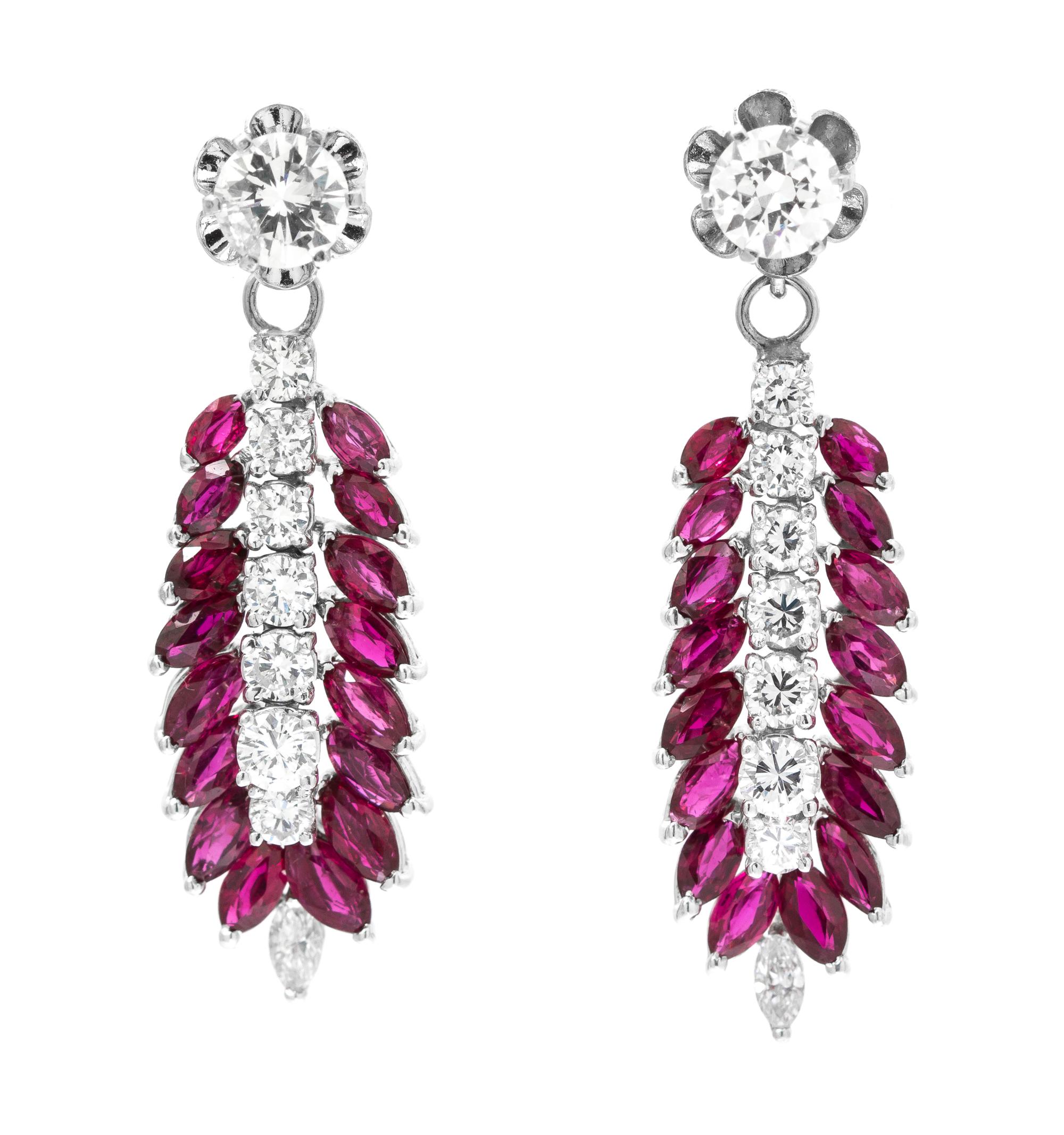 A Pair of White Gold Diamond Stud Earrings with Removable White Gold, Ruby and Diamond Enhancer Pendants, 6.70 dwts.