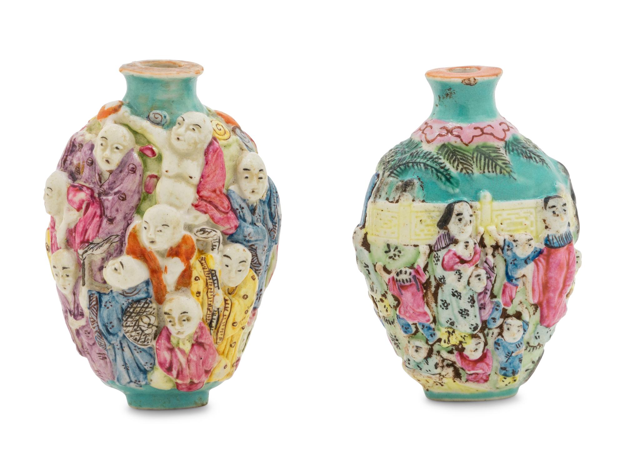Two Chinese Molded Famille Rose Porcelain Snuff Bottles
