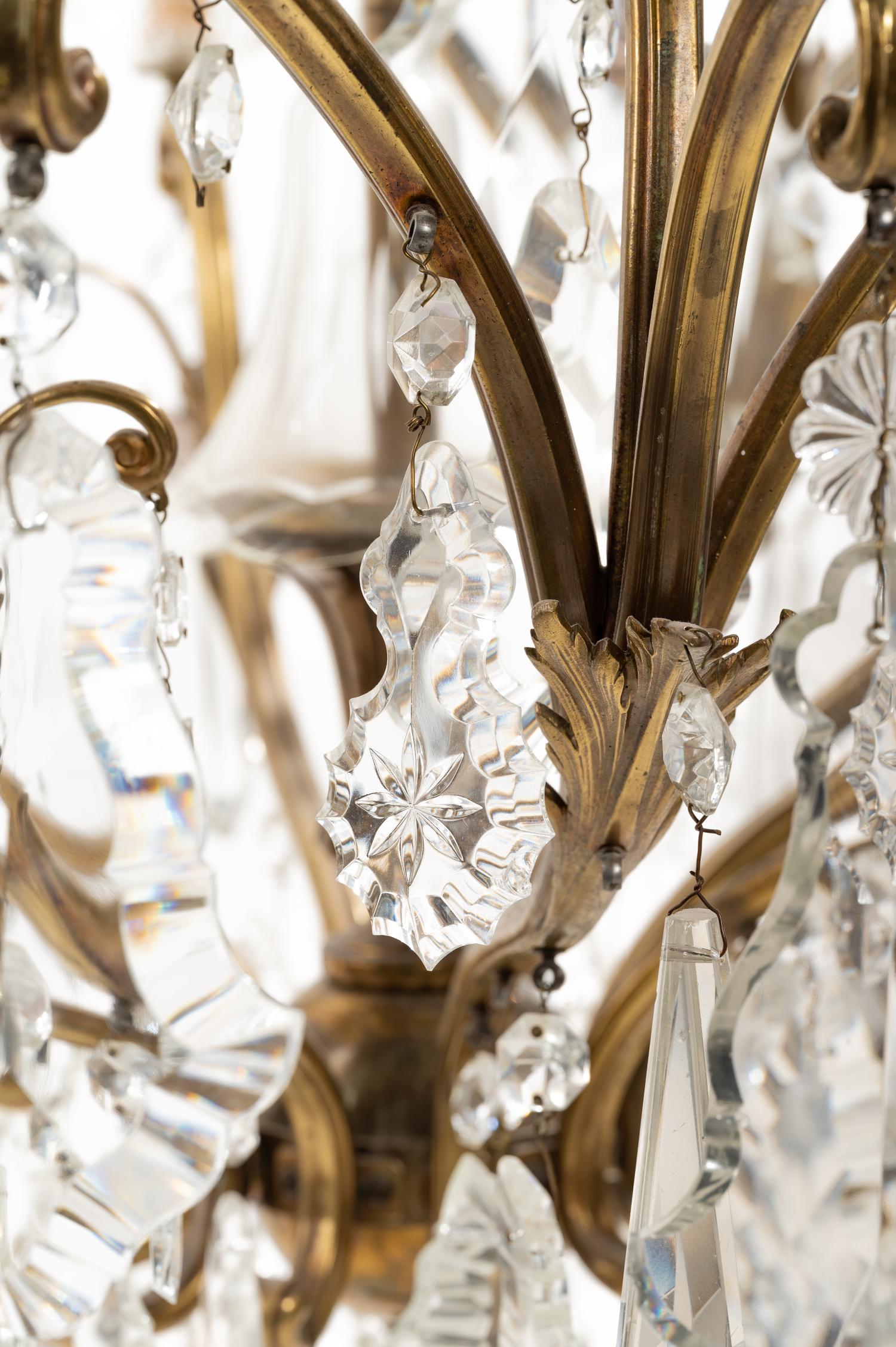 A French Gilt Metal and Glass Twenty-Light Chandelier