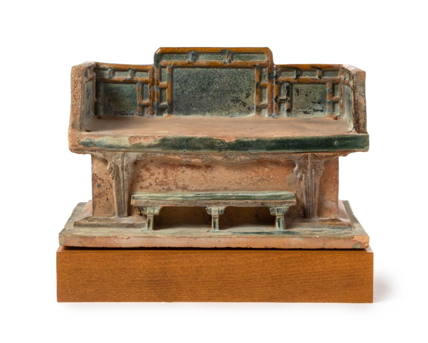 A Green Glazed Pottery Model of a Luohan Bed Length 13 3/4 inches. — MING DYNASTY (1348-1644)
