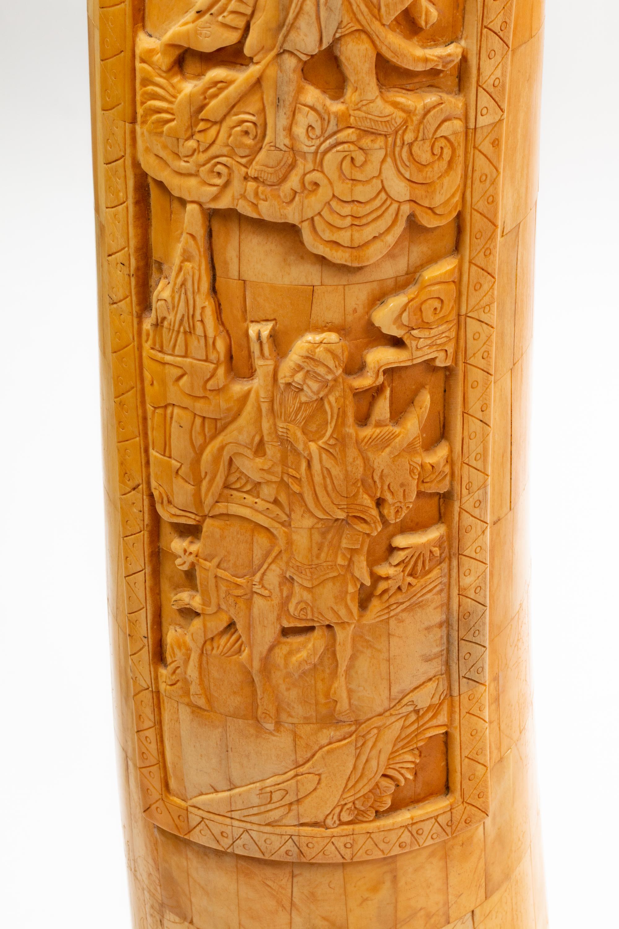 A Pair of Chinese Export Carved Bone Tusks with Wood Bases