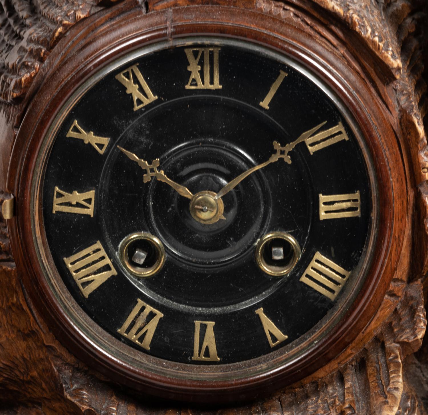 A Black Forest Carved Oak Stag-Form Mantel Clock