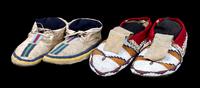 Two Pairs of Moccasins Length of longest 10 inches. — CIRCA 1890