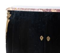 A Transitional Louis XV/XVI Style Gilt Bronze Mounted Ebonized Marble-Top Commode