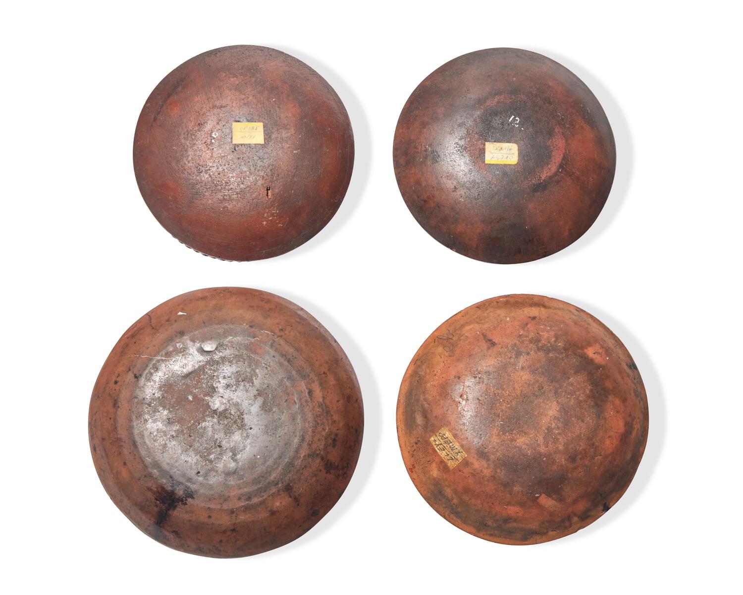 Four Small Slip-Decorated Redware plates, Pennsylvania, 19th Century