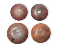 Four Small Slip-Decorated Redware plates, Pennsylvania, 19th Century