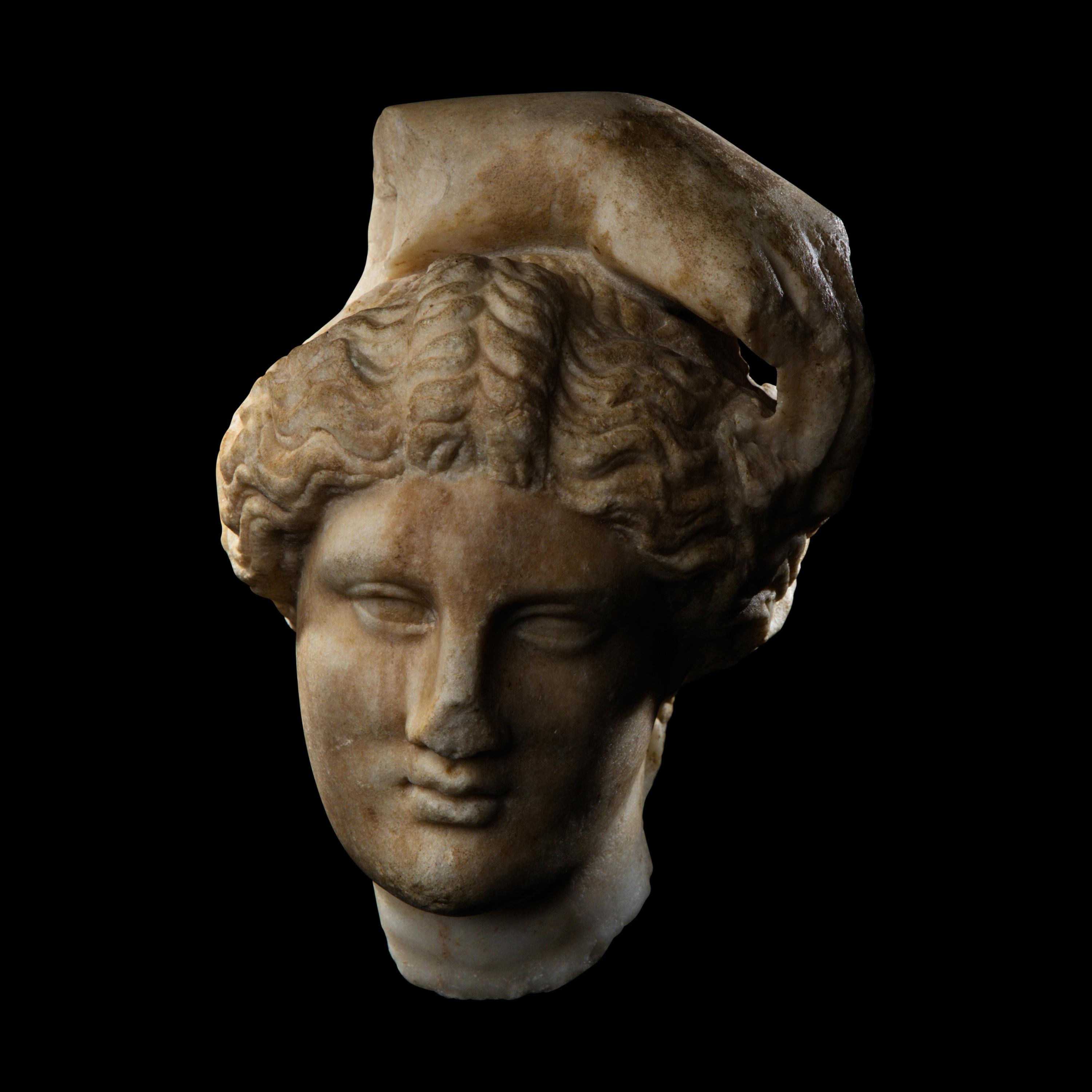 A Roman Marble Head of Apollo Lykeios