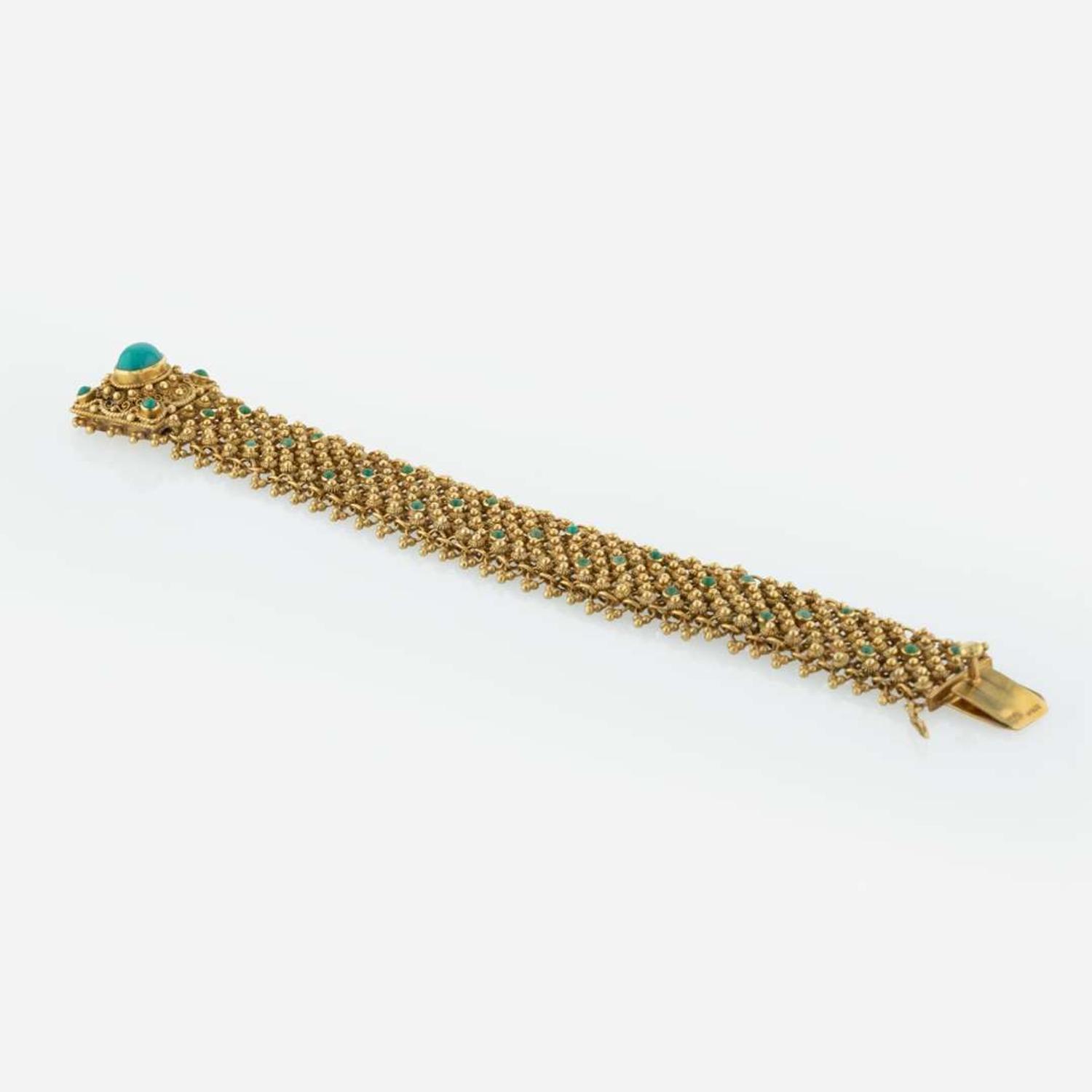 A Turquoise and 19K Yellow Gold Bracelet