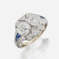 A diamond, sapphire, and platinum ring, J. E. Caldwell & Co.