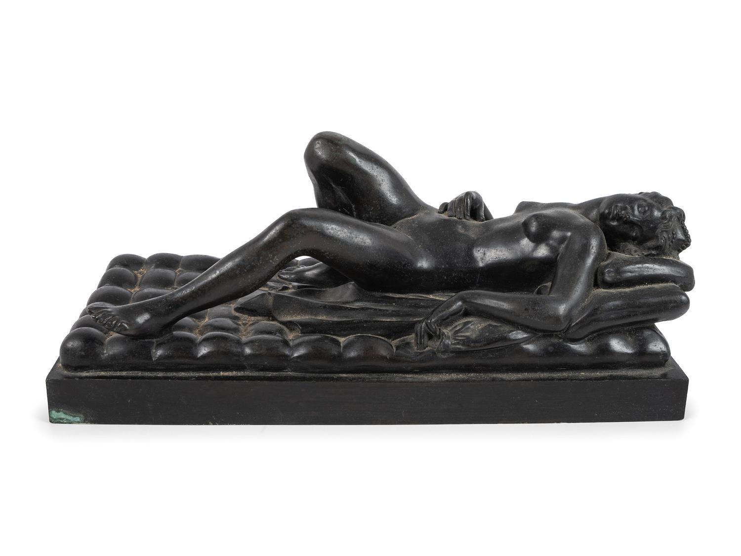 A Cast Bronze Figure of a Reclining Nude Woman