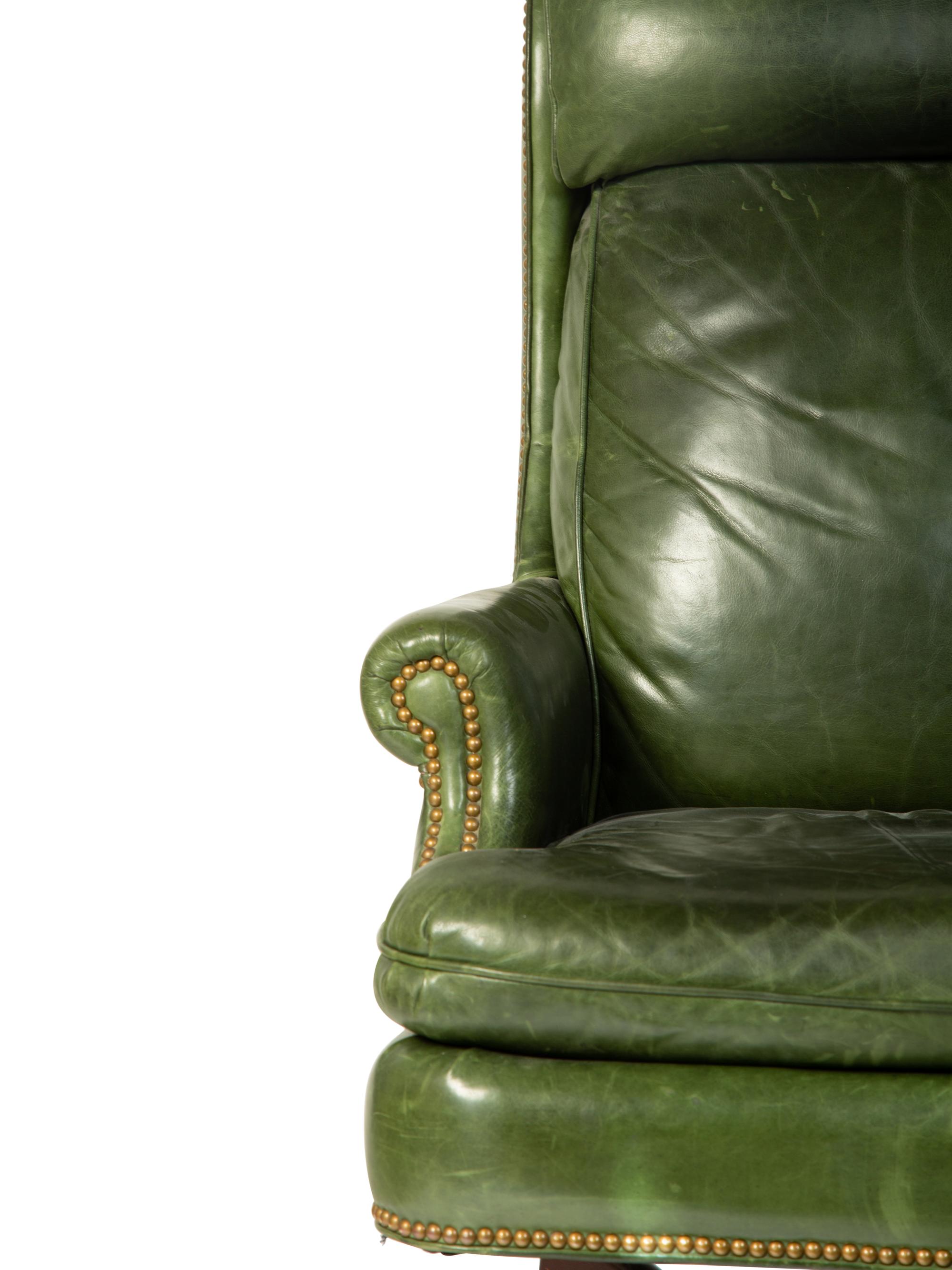 A Green Leather Office Chair — HANCOCK AND MOORE, 20TH CENTURY