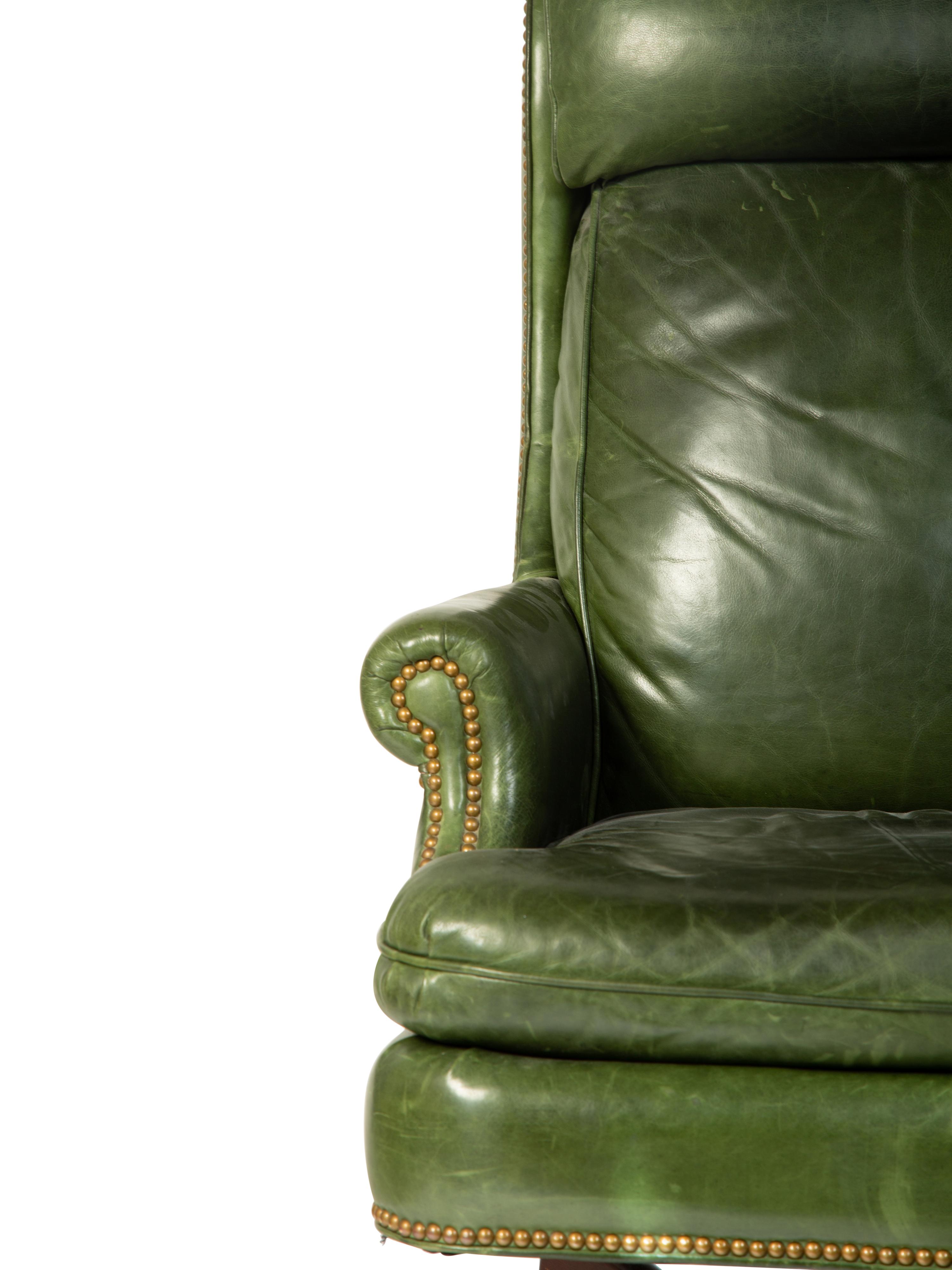 A Green Leather Office Chair — HANCOCK AND MOORE, 20TH CENTURY